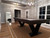 Doc & Holliday Savant 8' Slate Pool Table, Brown Sugar Finish in a modern game room with hardwood floors, a rug, large windows, and contemporary lighting fixtures.