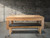 Doc & Holliday Paula Parsons Slate Pool Table, wooden pool table with black cushioned bench and minimalist design.