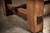 Doc & Holliday Churchill Slate Pool Table with Dining Top Option, close-up view of the wooden leg and frame showcasing the high-quality craftsmanship and warm wood finish.