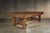 Doc & Holliday Churchill Slate Pool Table with Dining Top Option, wooden pool table with a rustic finish and a dining surface, set in an industrial-style room.
