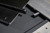 Doc & Holliday Churchill Pool Table, made in USA, showing a close-up of the black felt surface and wooden and metal components.