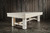 Doc & Holliday Churchill Slate Pool Table, USA, shown in a rustic setting with wooden walls and concrete floor.