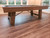 Plank & Hide Co Plank & Hide Isaac Slate Pool Table with wooden frame and slate surface in a room with hardwood flooring and large windows.