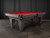 Doc & Holliday Denali Slate Pool Table, rustic charcoal colored pool table with a red felt playing surface and sturdy wooden legs.