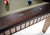 Brunswick Billiards Brunswick Henderson 8' Pool Table in Aged Linen, wooden frame with dark and light wood finish, featuring a cloth surface with billiard balls on top.