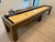 Brunswick Billiards Brunswick Parsons Shuffleboard Table, a wooden shuffleboard with a glossy finish and numbered scoring zones.