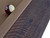 American Heritage Billiards Farmhouse Slate Pool Table in Cappuccino Finish, featuring a close-up of the wooden surface with textured dark finish and a portion of the cloth with a billiard ball nearby.