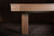 Doc & Holliday Santorini Walnut Pool Table by Doc & Holliday in custom-made USA, showcasing a walnut finish pool table with a sleek design, against a dark wooden backdrop.