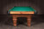 Doc & Holliday Rustic Slate Pool Table, handcrafted USA with a wooden frame, green felt surface, and traditional design.