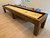 Brunswick Billiards Brunswick Parsons Pool Table & Shuffleboard Combo, wooden game table with a glossy shuffleboard surface and a pool table underneath.