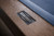 Doc & Holliday Hank Slate Pool Table, with rustic silver brown oak finish and a close-up of the branded metal plaque.