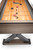 Brunswick Billiards Brunswick Premier Shuffleboard Table, a wooden tabletop with shuffle pucks and scoring zones.