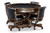 Brunswick Billiards Brunswick Centennial Game Table Set, round wooden dining table with black leather swivel chairs.