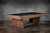 Doc & Holliday Kaci Slate Pool Table in Grey Walnut, modern billiards table with a sleek black playing surface and sturdy wooden frame in grey walnut finish.