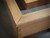 Doc & Holliday Hank Shuffleboard in Rustic Silver Brown Oak Finish, close-up of the wood corner showing detailed grain and smooth finish.