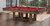 Plank & Hide Covington Slate Pool Table, modern wooden pool table with red felt interior and balls arranged on the surface, set in a bright room with large windows and scenic outdoor view.