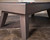 Doc & Holliday George Pool Table & Shuffleboard Combo in Glazed Pearl, close-up image showing the sleek wooden edges and angled legs of the game table.