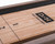 Doc & Holliday George Pool Table & Shuffleboard Combo in Glazed Pearl, close-up view of the wooden surface with black markings and logo.