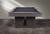 American Heritage Billiards Vancouver Slate Pool Table in Marble Grey, a modern pool table with a sleek slate surface and a sturdy wooden base with slatted design.