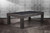 American Heritage Billiards Alta Pool Table in Marble Grey, a modern pool table with a sleek dark grey finish and a contemporary design, set against a patterned wall background.