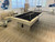 American Heritage Billiards Vancouver 8' Slate Pool Table in White Wash Finish, modern design with a black felt surface, placed in a stylish living room with contemporary furniture and artwork.
