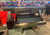 Plank & Hide Co Lennox Steel Slate Pool Table by Plank & Hide, modern steel slate pool table displayed at a trade show.