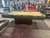Plank & Hide Co Plank & Hide Dali Slate Pool Table, Brushed Greige Finish, in a busy exhibition setting.