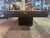 Plank & Hide Co Plank & Hide Dali Slate Pool Table with Brushed Greige Finish, showcased at a trade show with people and golf accessories in the background.