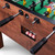 White background close-up of the Parsons Foosball Table, illustrating its custom finishes and exceptional build quality for upscale game rooms.