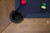 Overhead corner pocket view of the Doc & Holliday Redford Slate Pool Table with Championship Academy Blue felt, leather pocket detail, diamond sights, and Doc & Holliday billiard ball set.