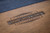 Close-up of Doc & Holliday Redford pool table Van Dyk wood grain and blue felt