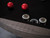 Kai 3-in-1 Game Table by Nixon Billiards in Antique finish with dining top flipped to reveal six-player poker layout, cup holders and chip trays visible