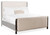 Hooker Furniture Retreat Queen Dark Wood Upholstered Panel Bed, a stylish bedroom furniture piece with a dark wood frame, upholstered headboard, and footboard, designed for a luxurious and comfortable sleeping experience.