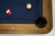 Doc & Holliday The Slater Slate Pool Table, viewed from above showing the blue felt surface with billiard balls and a corner cup.