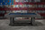 Doc & Holliday Hank Slate Pool Table – Marble Grey Finish, modern pool table with sleek marble grey finish, set against a rustic American flag background.