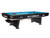 Brunswick Billiards Gold Crown VII 9' Tournament Edition Pool Table, blue felt surface with billiard balls racked at one end, and cue stick resting on the side.