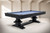 Environmental 3/4 view of the Sawyer Twain Exclusive Beaumont slate pool table in Black Ash, featuring Championship Academy Blue felt, solid ash wood construction, diamond billiard sights, and genuine leather pockets.