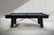Plank & Hide Co Isaac Slate Pool Table in Black Ash, modern billiards table with sleek black ash finish, set against a minimalist white wall background.