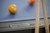 Plank & Hide Co Beaumont Slate Pool Table in Marble Grey, close-up of the wooden corner with metal plaque, showing the brand and model for premium quality billiards.
