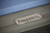 Plank & Hide Co Beaumont Slate Pool Table in Marble Grey, close-up of metal brand plaque on wooden frame.