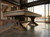 C.L. Bailey Viking Pool Table in Antique Oak, a sturdy and elegant centerpiece with rustic wood finish in a modern loft space.