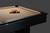 C.L. Bailey Addison Slate Pool Table in Black, featuring a beige playing surface with a set of billiard balls racked for a game.