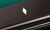 C.L. Bailey Duke Slate Pool Table, close-up of the sleek black playing surface with a small illuminated rectangular detail.