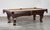 C.L. Bailey Elayna Slate Pool Table, classic wooden pool table with ornate carved legs and a beige felt playing surface.