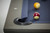 Doc & Holliday George Slate Pool Table in Marble Grey, close-up of the corner with billiard balls on the blue felt surface.
