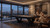 Doc & Holliday Savant 8' Slate Pool Table in Black Ash, modern living room with panoramic city views, two women playing pool and enjoying drinks.