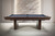 Side profile lifestyle shot of the Doc & Holliday Rook custom slate billiard table, made in the USA with a modern wood pedestal base.
