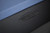 Doc & Holliday Peter Parsons Slate Pool Table, close-up view of the etched logo on the black matte lacquer surface.