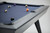 Doc & Holliday The Bellano Slate Pool Table, modern stylish pool table with a sleek gray finish and colorful billiard balls on a blue felt surface.