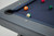 Doc & Holliday The Bellano Slate Pool Table, a high-quality pool table featuring a slate playing surface and colorful billiard balls.